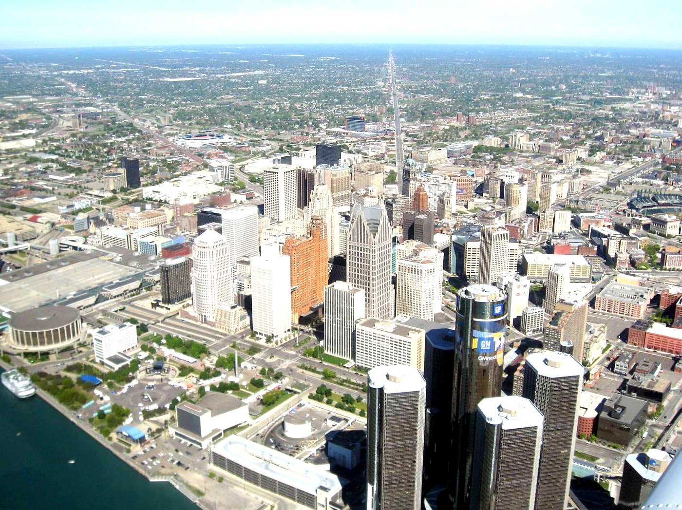 Aerial view of downtown Detroit and the Renaissance Center along the Detroit River